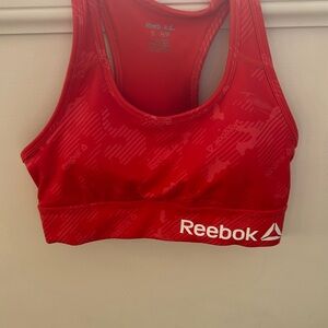 Reebok Red Sports Bra with Racerback Design and Moisture-Wicking Fabric